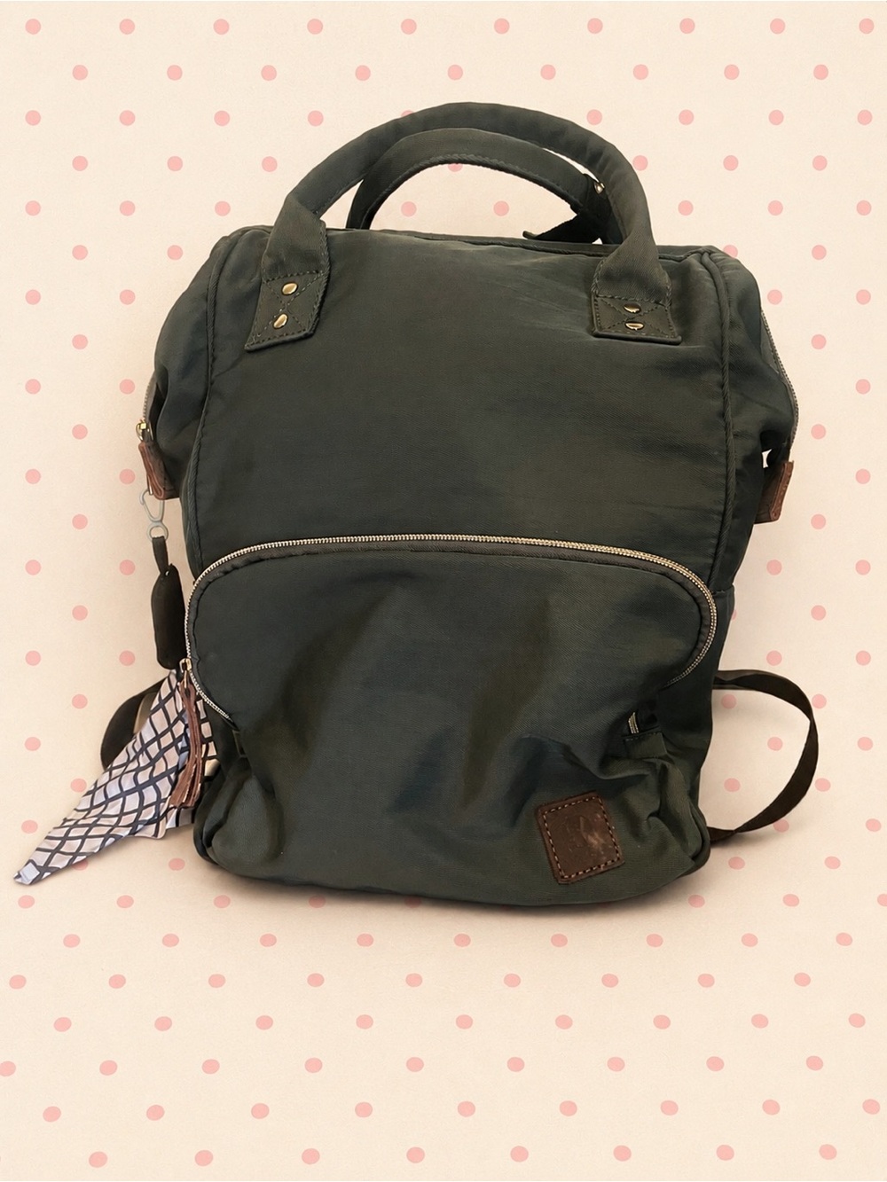 Gray Nylon Veegul travel bag or diaper bag with Front Zip Pocket.